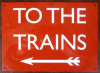 Railway station to the station sign.